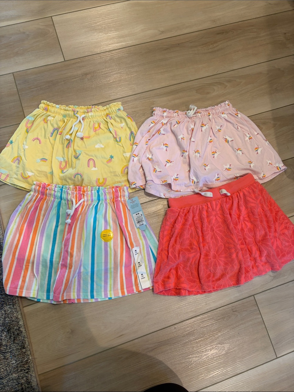 Cat & Jack skorts for girls size Medium. One new with tags, other 3 barely used.
